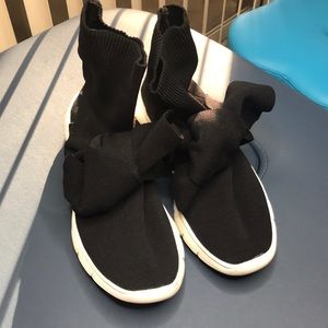 Joshua’s bowtie sock sneaker